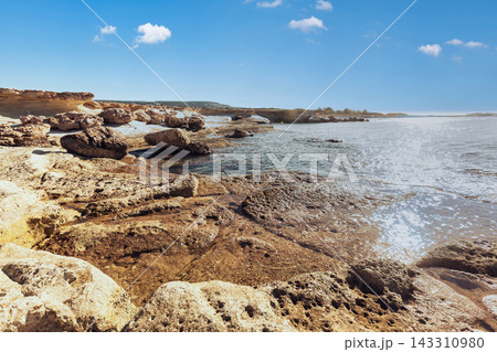Scenic Rocky Coastline and Blue Mediterranean Sea in Cyprus 143310980