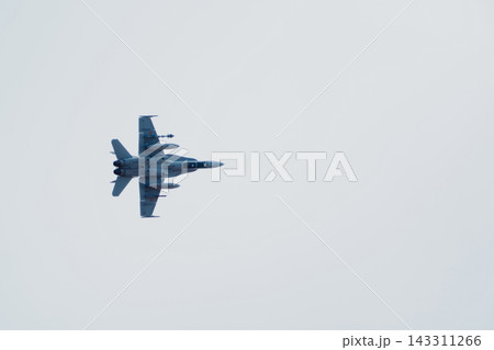 F 18 fighter jet flying in the sky 143311266