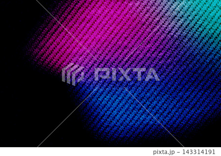 Diagonal Woven Texture Illuminated With Magenta, Blue And Cyan Patches Fading Into Black 143314191
