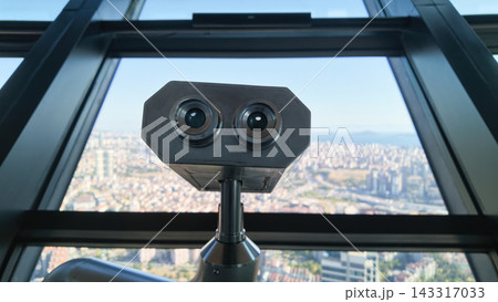 View of a city from a high vantage point with a robot observer in focus View of a city from a high vantage point with a robot observer in focus 143317033