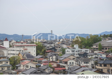April 30 2026 FUKUSHIMA, JAPAN. Urban skyline and mountains April 30 2026 FUKUSHIMA, JAPAN. Urban skyline and mountains 143317605