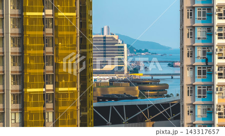 Hong Kong Aug 16 2026 Modern Kai Tak Cityscape with Airside Skyscraper Hong Kong Aug 16 2026 Modern Kai Tak Cityscape with Airside Skyscraper 143317657
