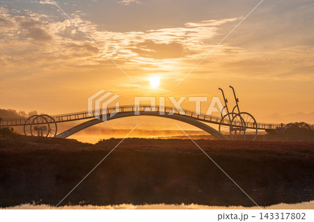 Sunrise Dawn over Misaeng Bridge with Water Reflection in Siheung Wetland, South Korea Sunrise Dawn over Misaeng Bridge with Water Reflection in Siheung Wetland, South Korea 143317802