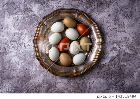 Farm blue, green and brown chicken eggs Farm blue, green and brown chicken eggs 143318494