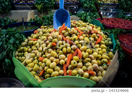 Assorted seasoned olives at a market stall in Fes souk 143324666