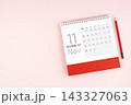 November 2027 desk calendar and red pencil, Position with copy space. 143327063