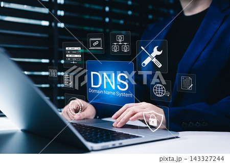 Domain Name System technology supports secure internet. Person manages DNS servers, website connectivity, network maintenance, cybersecurity and 24/7 digital operations for reliable business services 143327244