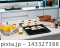 Empanada preparation in progress with golden lemons meat filling and dough ready to bake 143327388