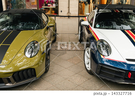 Modern Porsche 911 sports cars at Classic Days Berlin Modern Porsche 911 sports cars at Classic Days Berlin 143327716