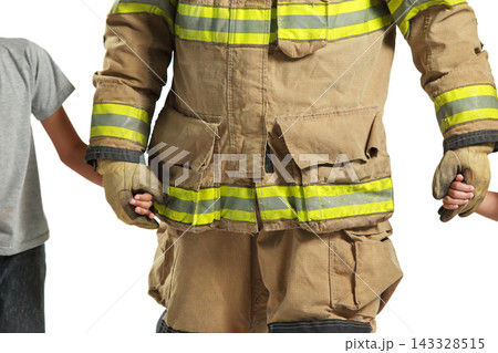 Asian male firefighter carrying child and leading another to safety 143328515