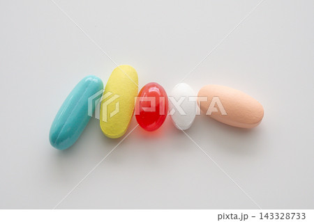 Colorful medicine pills tablet on white background Colorful medicine pills tablet on white background 143328733