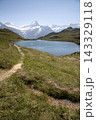 Bachalpsee lake reflecting bernese alps mountains in switzerland 143329118