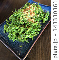 ベトナム・ホーチミンの名物料理 夜香花のつぼみとニンニクの炒め物（ボン・ティエン・リー・サオ・トイ） 143330361
