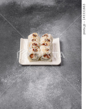 Sushi roll with tuna, rice, and cream cheese, served with soy sauce, wasabi, and ginger. Tuna roll Sushi roll with tuna, rice, and cream cheese, served with soy sauce, wasabi, and ginger. Tuna roll 143331663