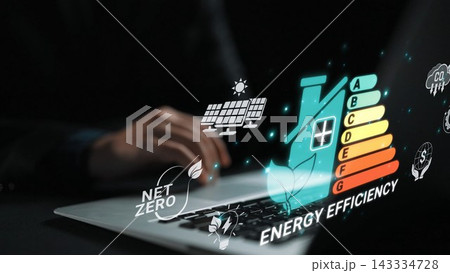 This image showcases a laptop displaying energy efficiency concepts with eco-friendly icons, symbolizing a commitment to sustainability and reducing carbon emissions. Sigmoid 143334728
