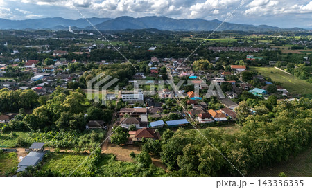 Aerial view of suburb area in Chiang Rai province, Thailand. This is the northernmost province in Thailand, famous for its rich Lanna history, mountain landscapes, and unique art landmarks. 143336335