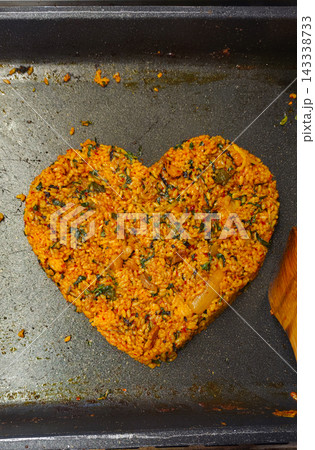 Making crispy Korean fried rice mixing with sauce from dakgalbi on flat pan Making crispy Korean fried rice mixing with sauce from dakgalbi on flat pan 143338733