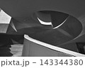 Spiral Concrete Staircase Curves With Dramatic Light and Shadow In Minimal Modern Architecture 143344380
