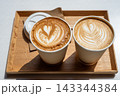Two Lattes With Heart Latte Art In Paper Cups On Wooden Tray, Takeaway Coffee 143344384
