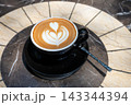 Beautifully crafted latte on a marble table 143344394