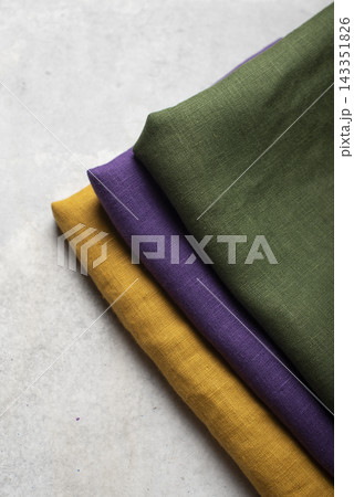 Folded Curry Yellow Green Purple Linen Fabric Cuts Folded Curry Yellow Green Purple Linen Fabric Cuts 143351826