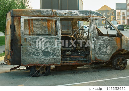 Burned Out Delivery Van Side Panel Destroyed by Severe Fire Burned Out Delivery Van Side Panel Destroyed by Severe Fire 143352432