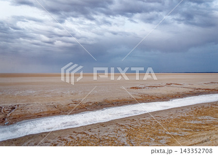 Layered Horizontal Landscape Photograph of Saline Water Channels in Arid Chott el Djerid Salt Flat Layered Horizontal Landscape Photograph of Saline Water Channels in Arid Chott el Djerid Salt Flat 143352708