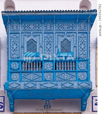 Traditional Blue Carved Wood Mashrabiya Window and Balcony 143352762