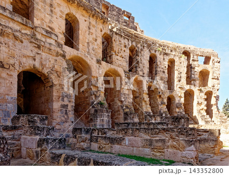 Tracking Shot of MultiTiered Arched Arena Wall and Weathered Stone Foundations inside El Jem Amphitheatre Tracking Shot of MultiTiered Arched Arena Wall and Weathered Stone Foundations inside El Jem Amphitheatre 143352800