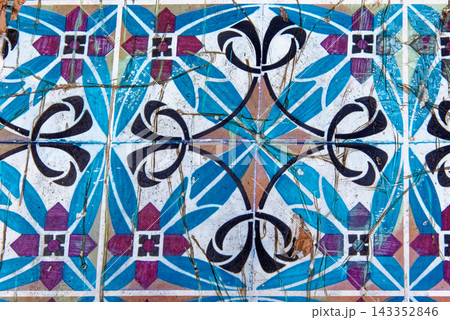 Full Frame Texture Shot of Distressed Traditional Tunisian Ceramic Wall Tiles with Geometric Pattern 143352846