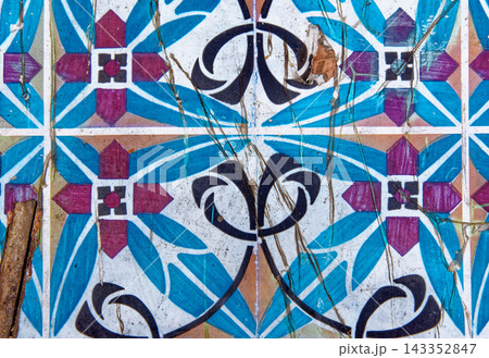Full Frame Texture Shot of Distressed Traditional Tunisian Ceramic Wall Tiles with Geometric Pattern 143352847