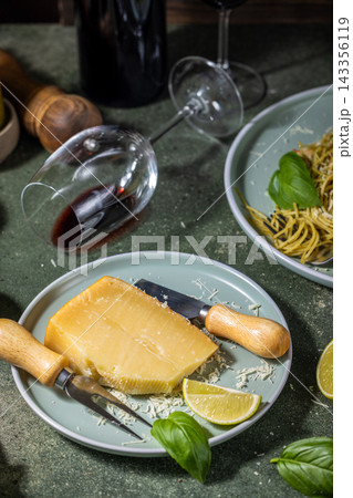 Italian dinner with parmesan cheese, pasta, and red wine Italian dinner with parmesan cheese, pasta, and red wine 143356119
