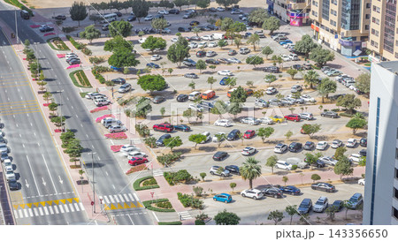 Top view of parking lot timelapse from rooftop of skyscraper 143356650
