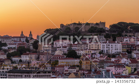 Lisbon aerial cityscape skyline night to day timelapse from viewpoint of St. Peter of Alcantara, Portugal Lisbon aerial cityscape skyline night to day timelapse from viewpoint of St. Peter of Alcantara, Portugal 143356732