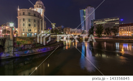 Urania and Danube Canal day to night timelapse in Vienna. 143356845