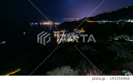 Day to night timelapse view of the Mediterranean coastline of the town of Eze village on the French Riviera Day to night timelapse view of the Mediterranean coastline of the town of Eze village on the French Riviera 143356988