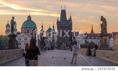 Charles Bridge in Prague before the sunrise night to day timelapse, Bohemia, Czech Republic. Charles Bridge in Prague before the sunrise night to day timelapse, Bohemia, Czech Republic. 143357010