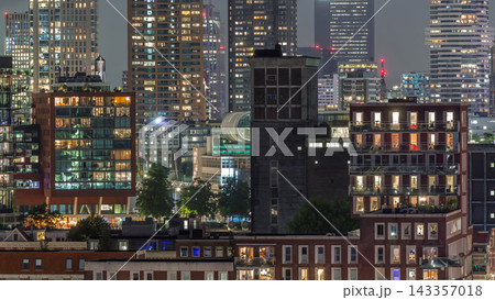 Aerial day to night timelapse of Katendrecht peninsula and Maashaven harbour in Rotterdam, The Netherlands. 143357018