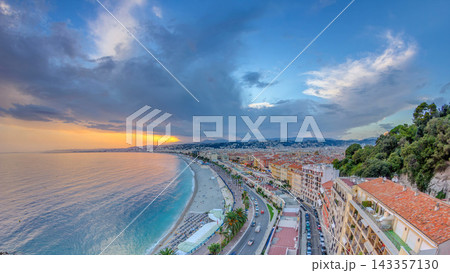 Sunset over Nice city and Mediterranean Sea aerial timelapse 143357130