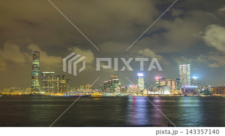 Skyline panorama timelapse day to night with International Commerce Centre in West Kowloon, Hong Kong. 143357140
