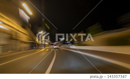 Monaco city roads traffic at night with car light trails timelapse hyperlapse drivelapse 143357387
