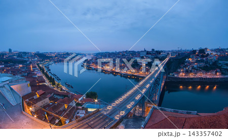 Day to night view of the historic city of Porto, Portugal timelapse with the Dom Luiz bridge Day to night view of the historic city of Porto, Portugal timelapse with the Dom Luiz bridge 143357402