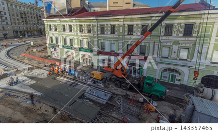 Concrete works for road construction with many workers and mixer timelapse Concrete works for road construction with many workers and mixer timelapse 143357465