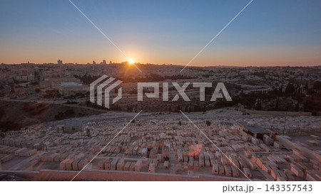 Jerusalem panorama view over the City at sunset timelapse with the Dome of the Rock from the Mount of Olives. Jerusalem panorama view over the City at sunset timelapse with the Dome of the Rock from the Mount of Olives. 143357543