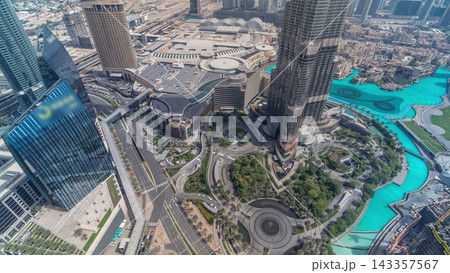 Dubai downtown street with busy traffic and skyscrapers around timelapse. Dubai downtown street with busy traffic and skyscrapers around timelapse. 143357567