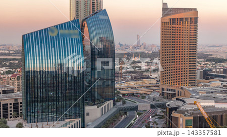 Dubai downtown street with busy traffic and skyscrapers around timelapse. Dubai downtown street with busy traffic and skyscrapers around timelapse. 143357581