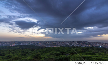 Panoramic view over Lisbon and Almada from a viewpoint in Monsanto night to day timelapse. Panoramic view over Lisbon and Almada from a viewpoint in Monsanto night to day timelapse. 143357688