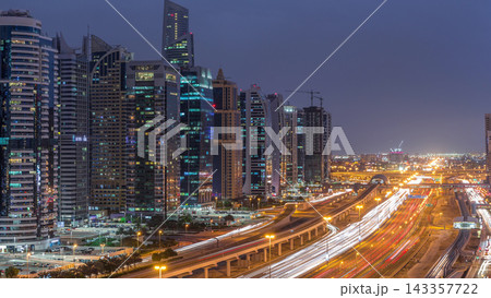 Aerial top view to Sheikh Zayed road near Dubai Marina and JLT day to night timelapse, Dubai. 143357722