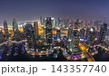 Aerial top view of Dubai Marina day to night timelapse. Modern towers and traffic on the road 143357740