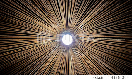 Woven Bamboo Lamp Shade Centered Light Bulb View Woven Bamboo Lamp Shade Centered Light Bulb View 143361899